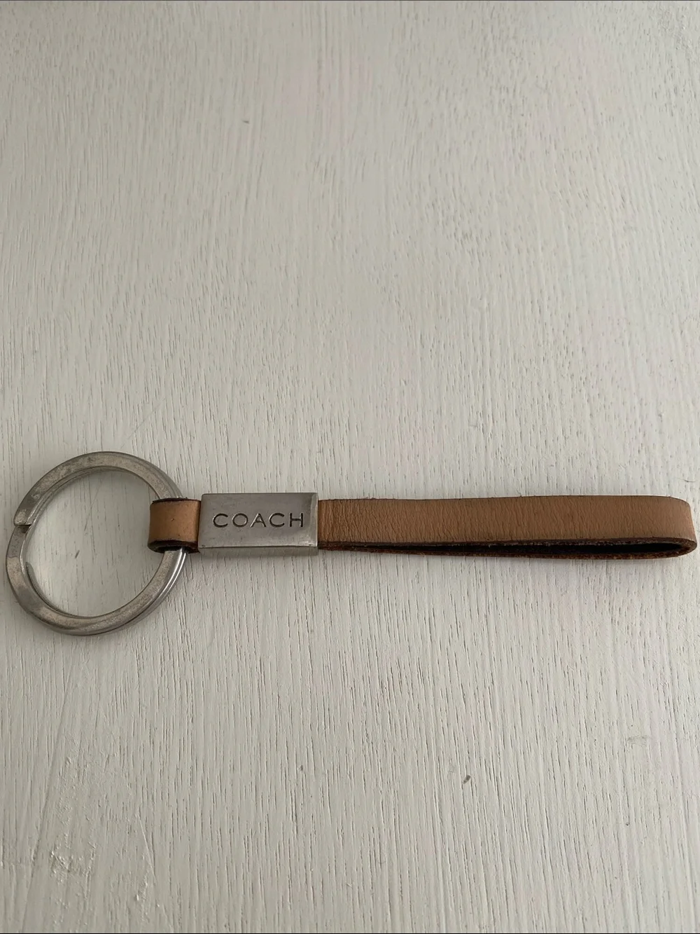 Coach leather strap keychain beige